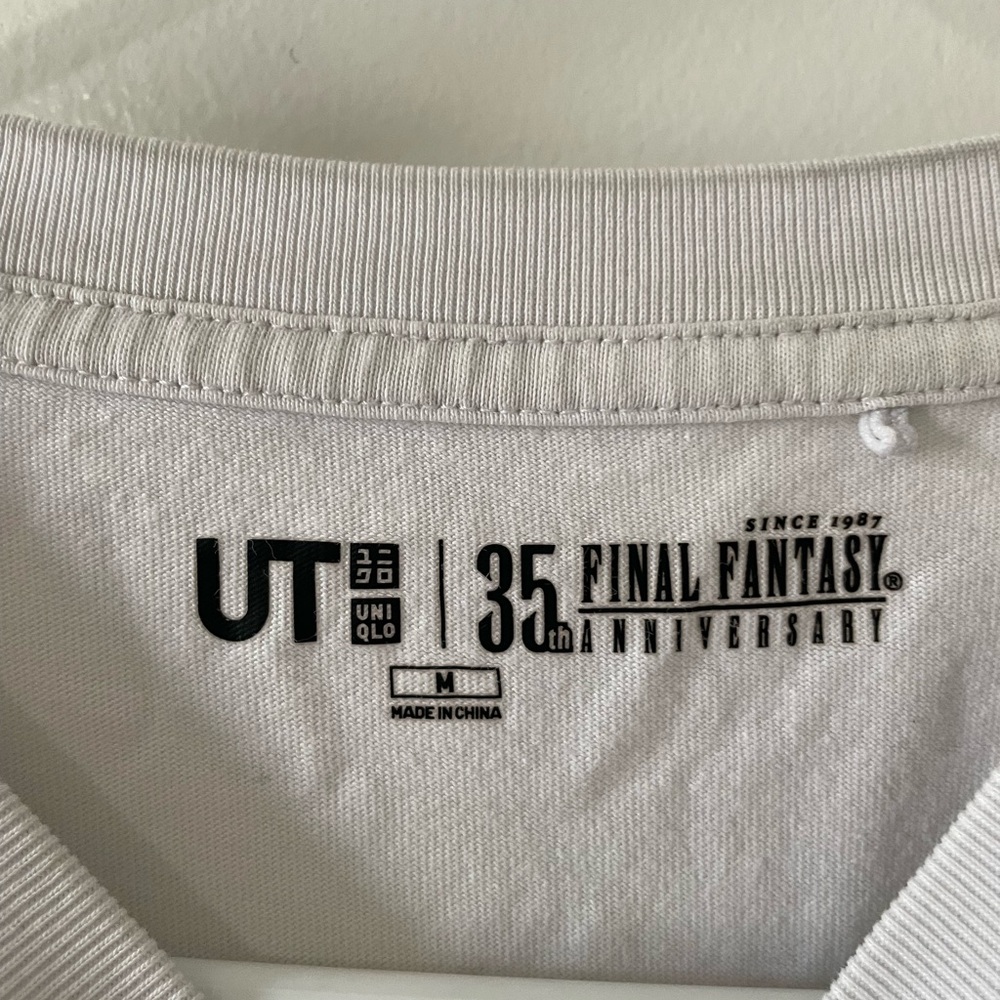 Uniqlo White Men’s Pocket Tee with Yellow Chocobo Icons - Picture 4 of 4
